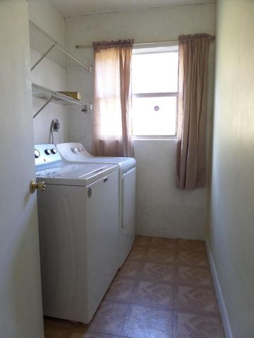 8633 Pluto Terrace, West Palm Beach, FL 33403