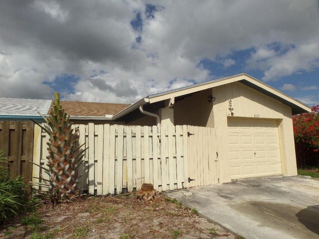 8633 Pluto Terrace, West Palm Beach, FL 33403