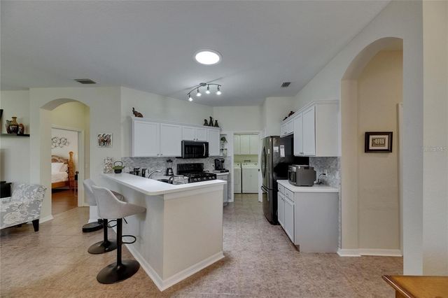 2068 SIFIELD GREENS WAY, Sun City Center, FL 33573