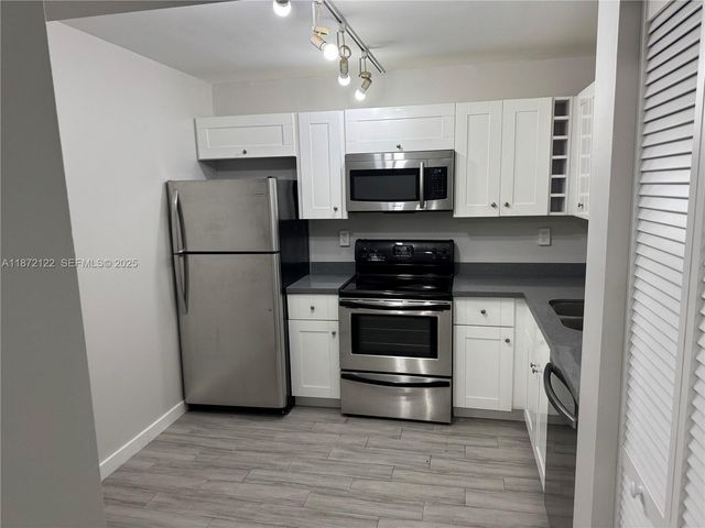 721 N Pine Island Road 201, Plantation, FL 33324
