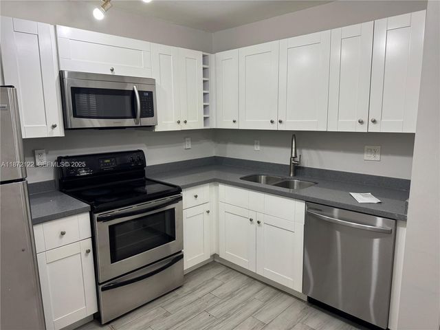 721 N Pine Island Road 201, Plantation, FL 33324