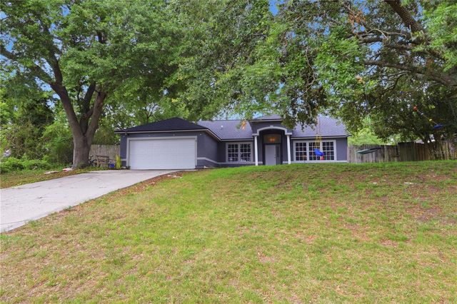 725 W 9TH STREET, Deltona, FL 32725
