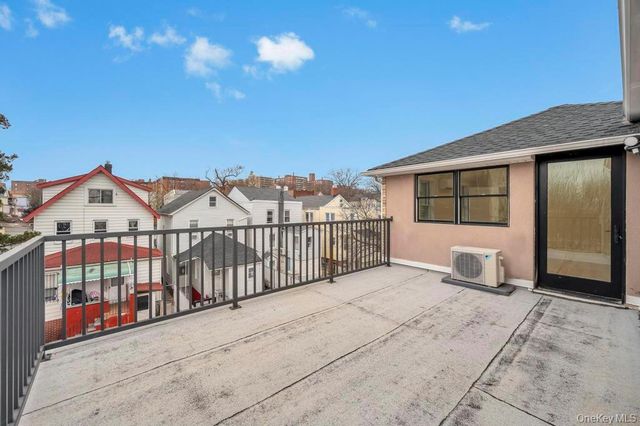 38-22 56 Street, Woodside, NY 11377