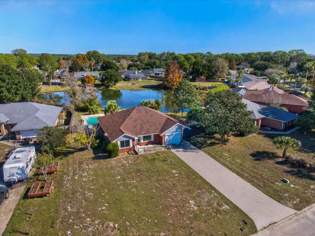 2989 Via Conquistadores, Navarre, FL 32566