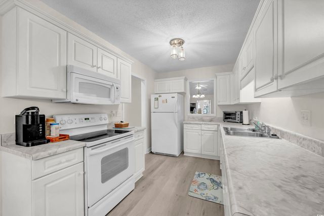 404 Sunset Oaks Ln., Sunset Beach, NC 28468