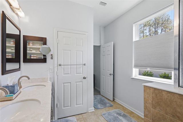 124 S HUMMINGBIRD PLACE, Palm Coast, FL 32164