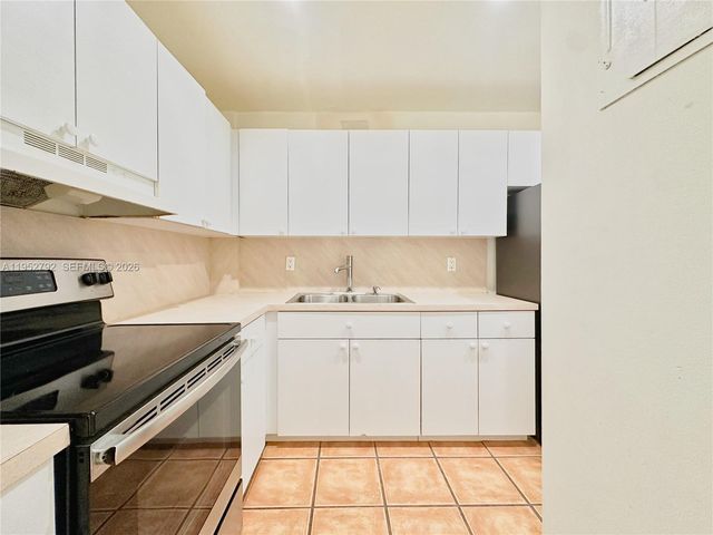 5050 NW 7th St 705, Miami, FL 33126