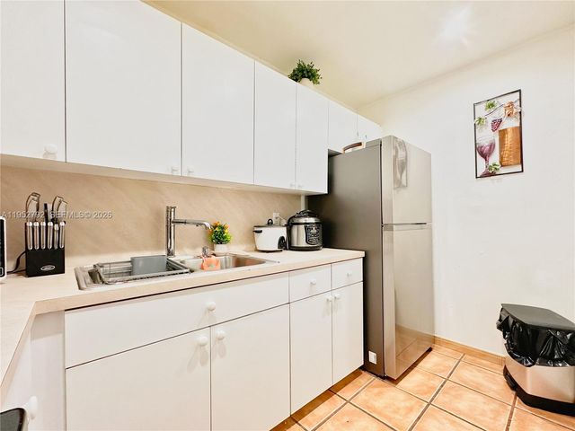 5050 NW 7th St 705, Miami, FL 33126