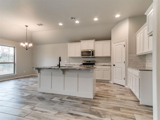 12104 Rockbed Drive, Yukon, OK 73099