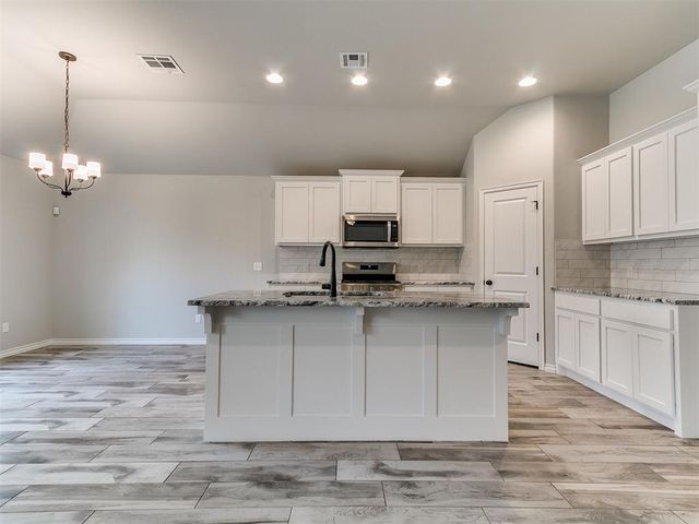 12104 Rockbed Drive, Yukon, OK 73099