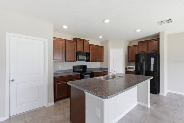 7412 ROSY PERIWINKLE COURT, Tampa, FL 33619