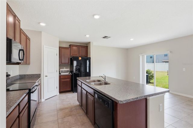7412 ROSY PERIWINKLE COURT, Tampa, FL 33619