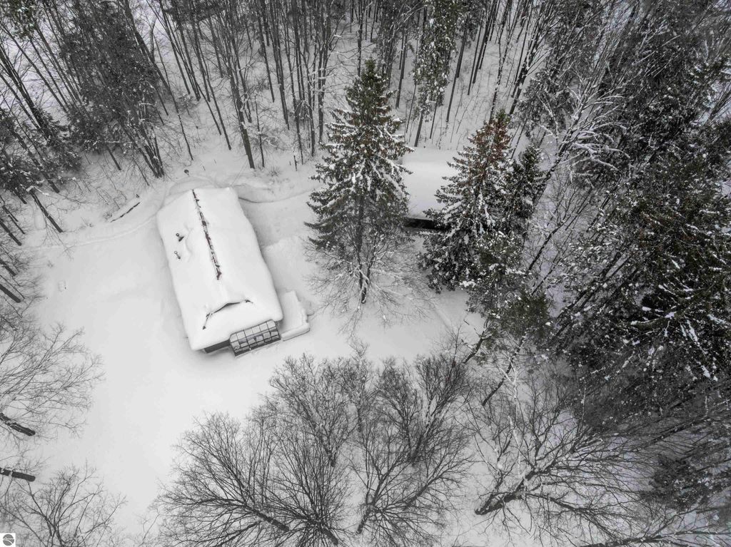 Image 10 of property listing at 8460 NE Covert Road, Mancelona, MI 49659