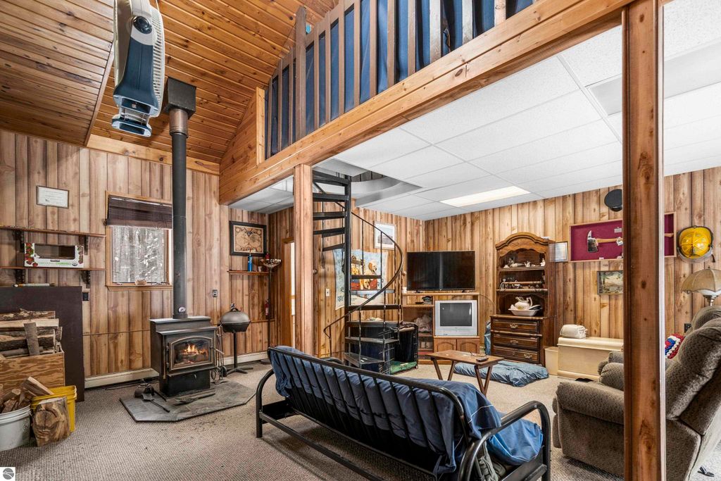 Image 25 of property listing at 8460 NE Covert Road, Mancelona, MI 49659