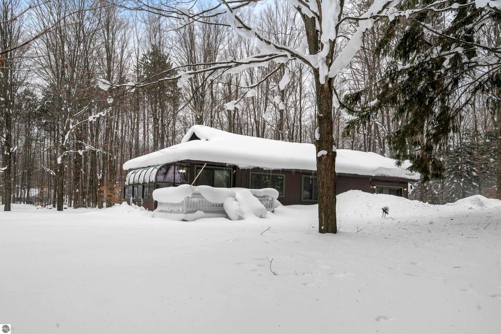 Image 47 of property listing at 8460 NE Covert Road, Mancelona, MI 49659