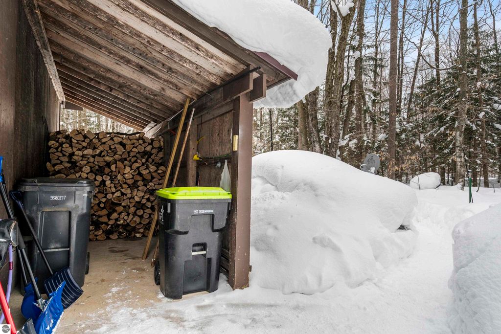 Image 50 of property listing at 8460 NE Covert Road, Mancelona, MI 49659