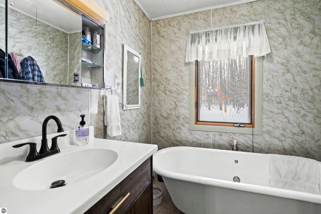 Image 7 of property listing at 8460 NE Covert Road, Mancelona, MI 49659