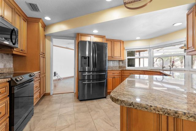 12114 RHONDA TERRACE, Seminole, FL 33772