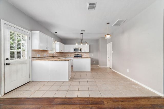 9823 Lynette Falls Drive, Houston, TX 77095