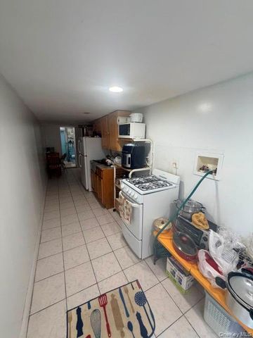 3056 87th Street, East Elmhurst, NY 11369