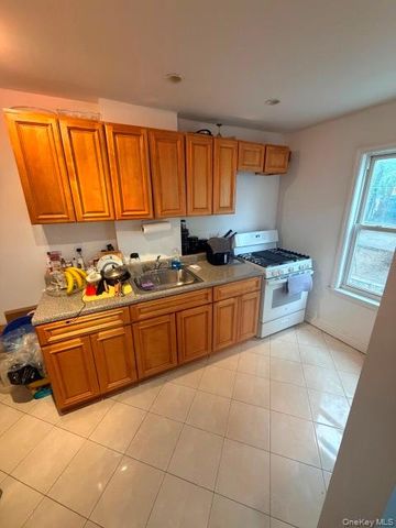 3056 87th Street, East Elmhurst, NY 11369