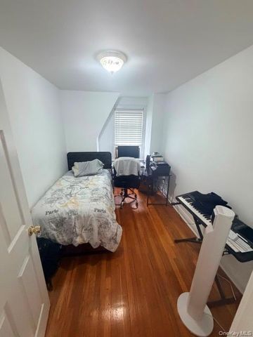 3056 87th Street, East Elmhurst, NY 11369