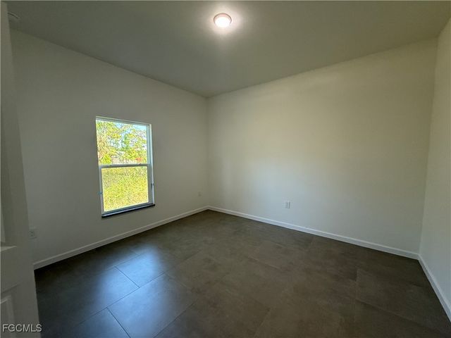 1046 Marshall AVE S, Lehigh Acres, FL 33974