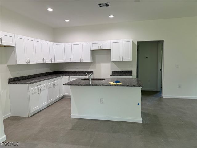 1046 Marshall AVE S, Lehigh Acres, FL 33974