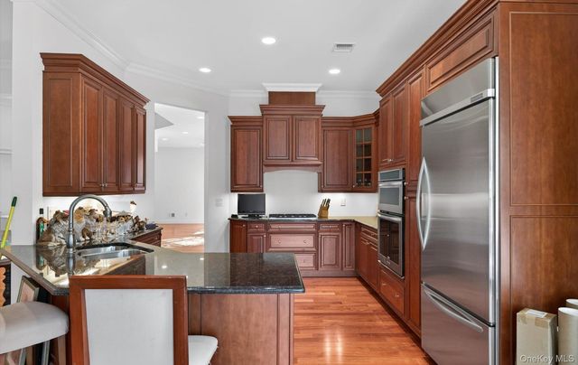 702 Equestrian Way, Westbury, NY 11590