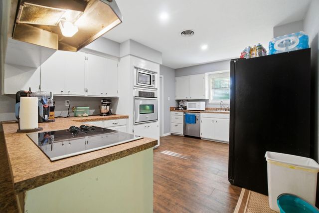 6161 Woodland Lakes Loop, Willis, TX 77378