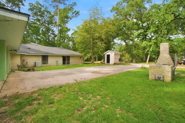 6161 Woodland Lakes Loop, Willis, TX 77378