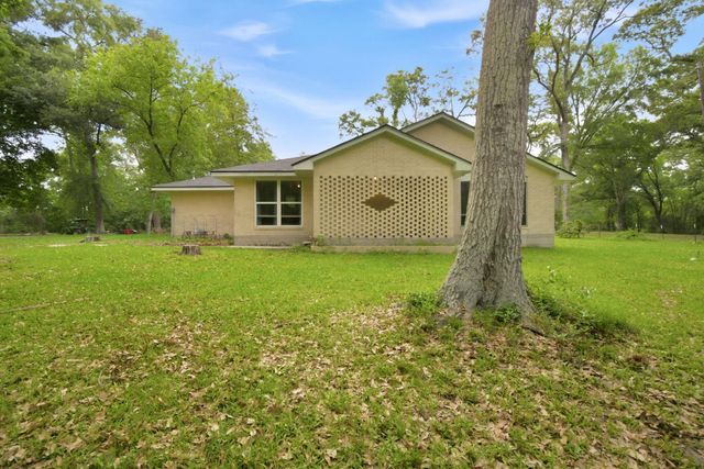 6161 Woodland Lakes Loop, Willis, TX 77378