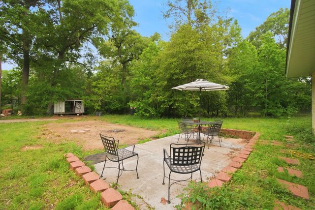 6161 Woodland Lakes Loop, Willis, TX 77378