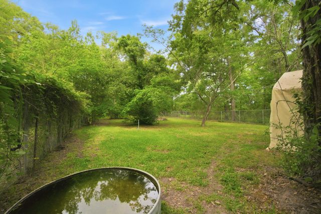 6161 Woodland Lakes Loop, Willis, TX 77378