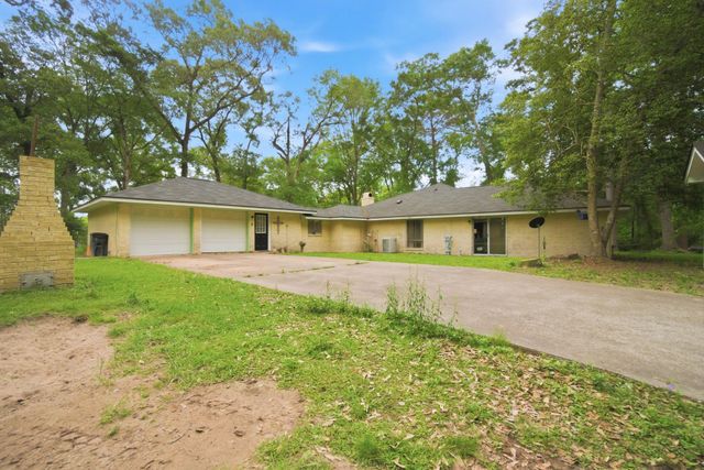 6161 Woodland Lakes Loop, Willis, TX 77378