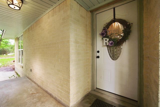 6161 Woodland Lakes Loop, Willis, TX 77378