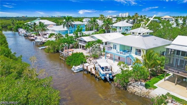 1296 Grand Canal DR, Naples, FL 34110