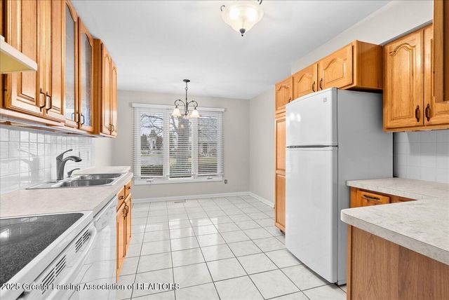 1283 N Chartwell Carriage Way, East Lansing, MI 48823