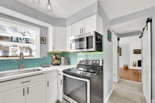 9025 S BONNET DR, Sandy, UT 84093