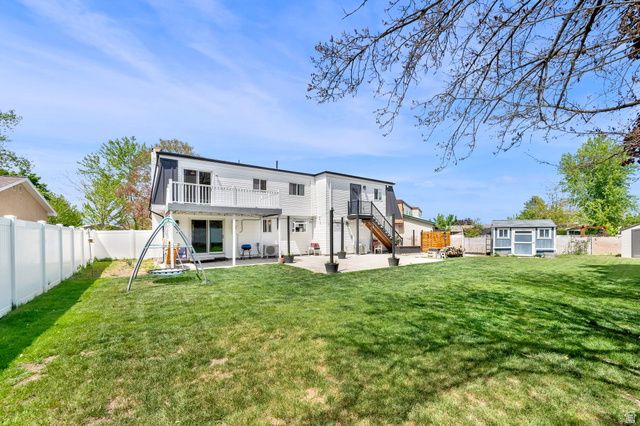 9025 S BONNET DR, Sandy, UT 84093