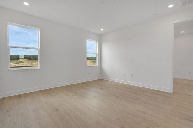 1018 SWAMP CHESTNUT LOOP, Lady Lake, FL 32159