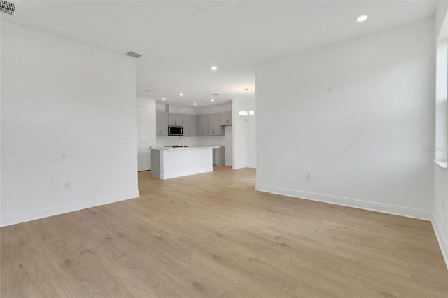 1018 SWAMP CHESTNUT LOOP, Lady Lake, FL 32159