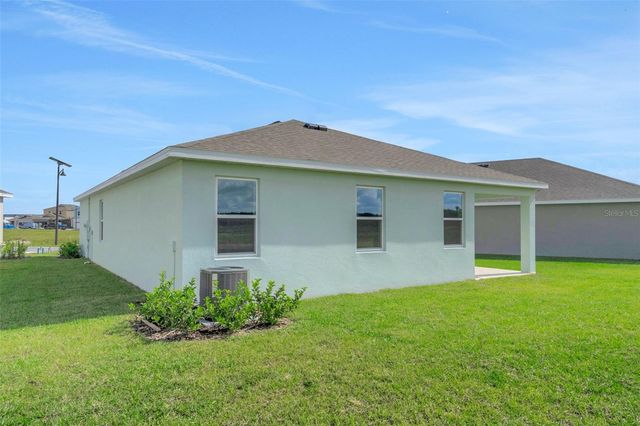 1018 SWAMP CHESTNUT LOOP, Lady Lake, FL 32159