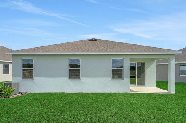 1018 SWAMP CHESTNUT LOOP, Lady Lake, FL 32159