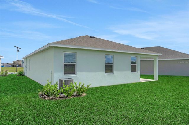 1018 SWAMP CHESTNUT LOOP, Lady Lake, FL 32159