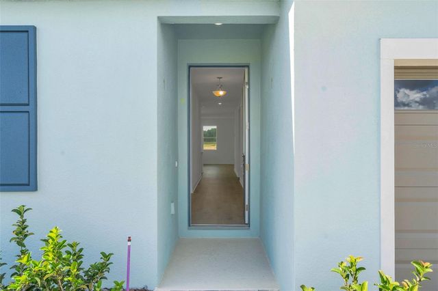 1018 SWAMP CHESTNUT LOOP, Lady Lake, FL 32159