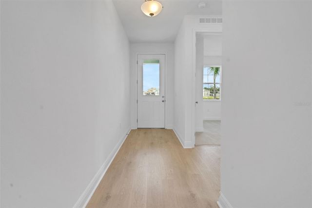 1018 SWAMP CHESTNUT LOOP, Lady Lake, FL 32159