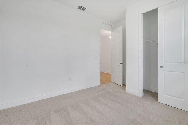 1018 SWAMP CHESTNUT LOOP, Lady Lake, FL 32159