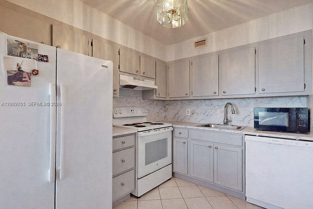13450 SW 3rd Street 408D, Pembroke Pines, FL 33027