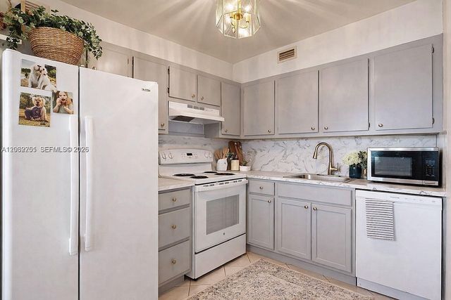 13450 SW 3rd Street 408D, Pembroke Pines, FL 33027